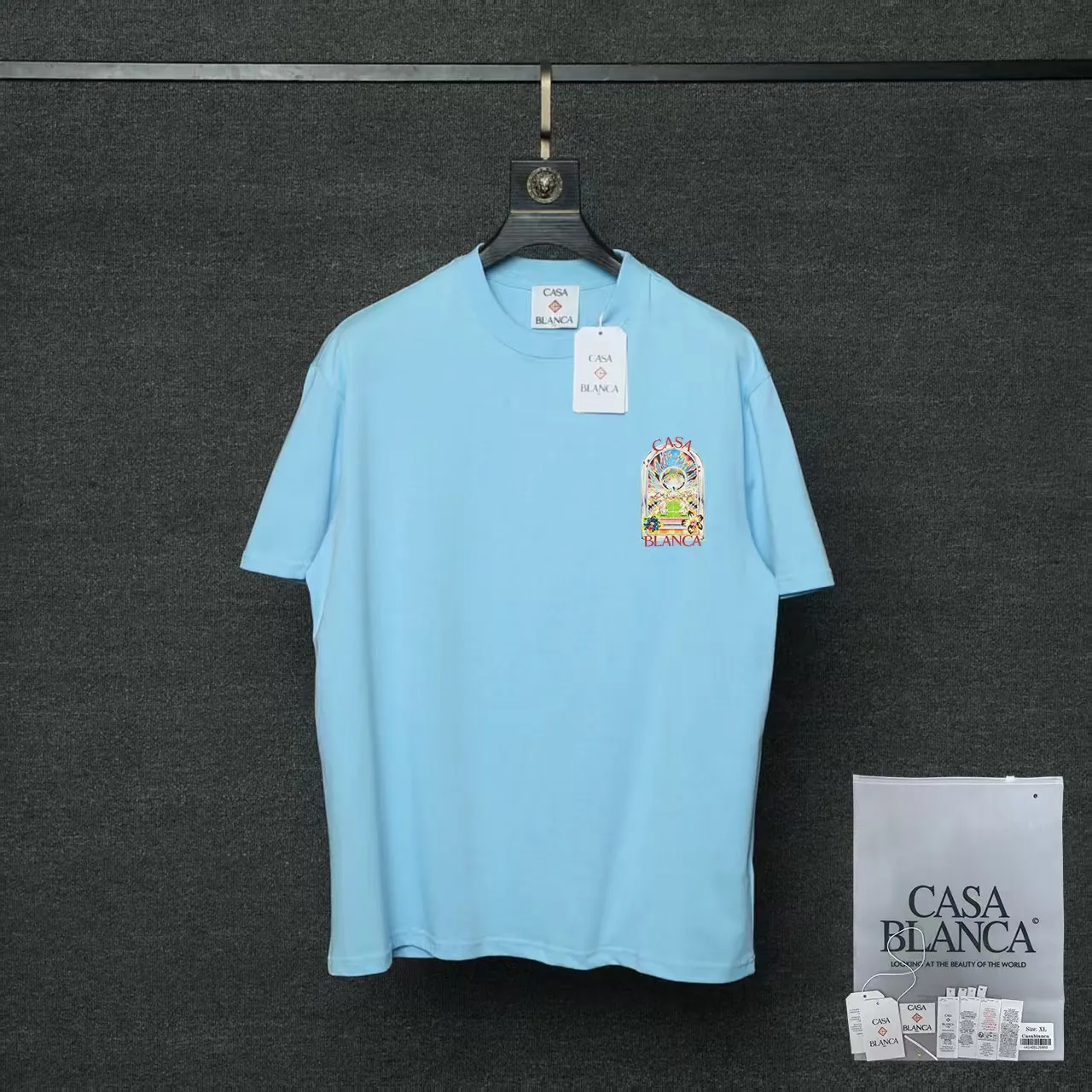 26ss CASABLANCA original printing process short-sleeved T-shirt original development using high-density double yarn pure cotton fabric upper body soft and comfortable color Black White Dark Green color Orange Pink Blue Royal Blue color cigarette powder 8 colors Sizes S M L XL